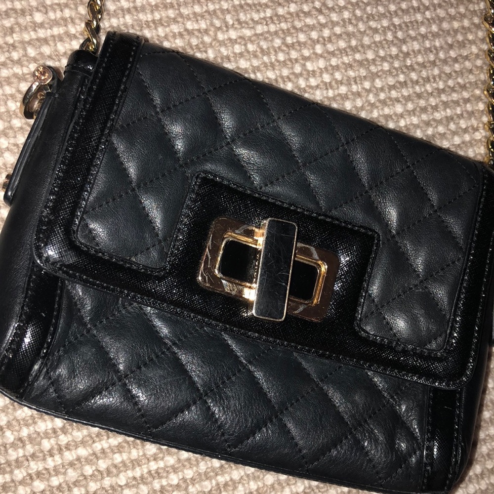 C. Wonder Black faux leather crossbody